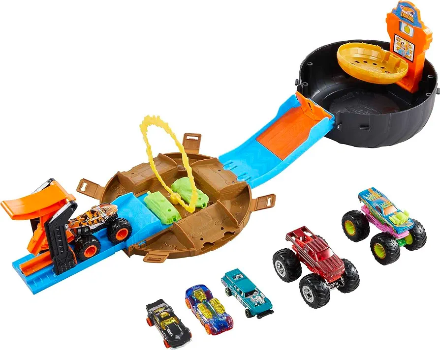 Hot Wheels Toy Monster Trucks Playset, Tire-Shaped Case Transforms into Race Course, 3 Trucks & 4 Cars in 1:64 Scale, Stunt Tire (Amazon Exclusive)