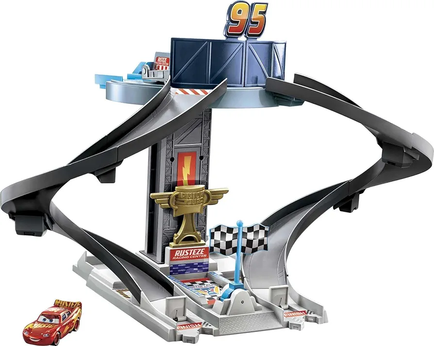 Disney Cars Toys Rust-Eze Racing Tower Race Track Toy with Training Areas, Spiral Track, Lightning McQueen Vehicle for Movie Story and Competition Play, Kids Race Set Birthday Gift Ages 4 and Older